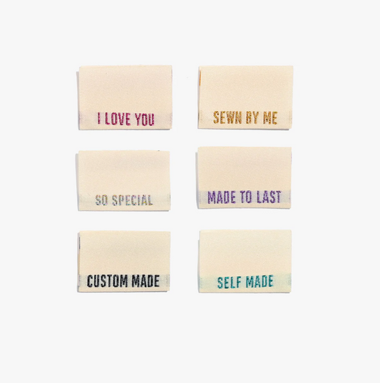 "Metallic Side Seam" (cream) labels - KATM