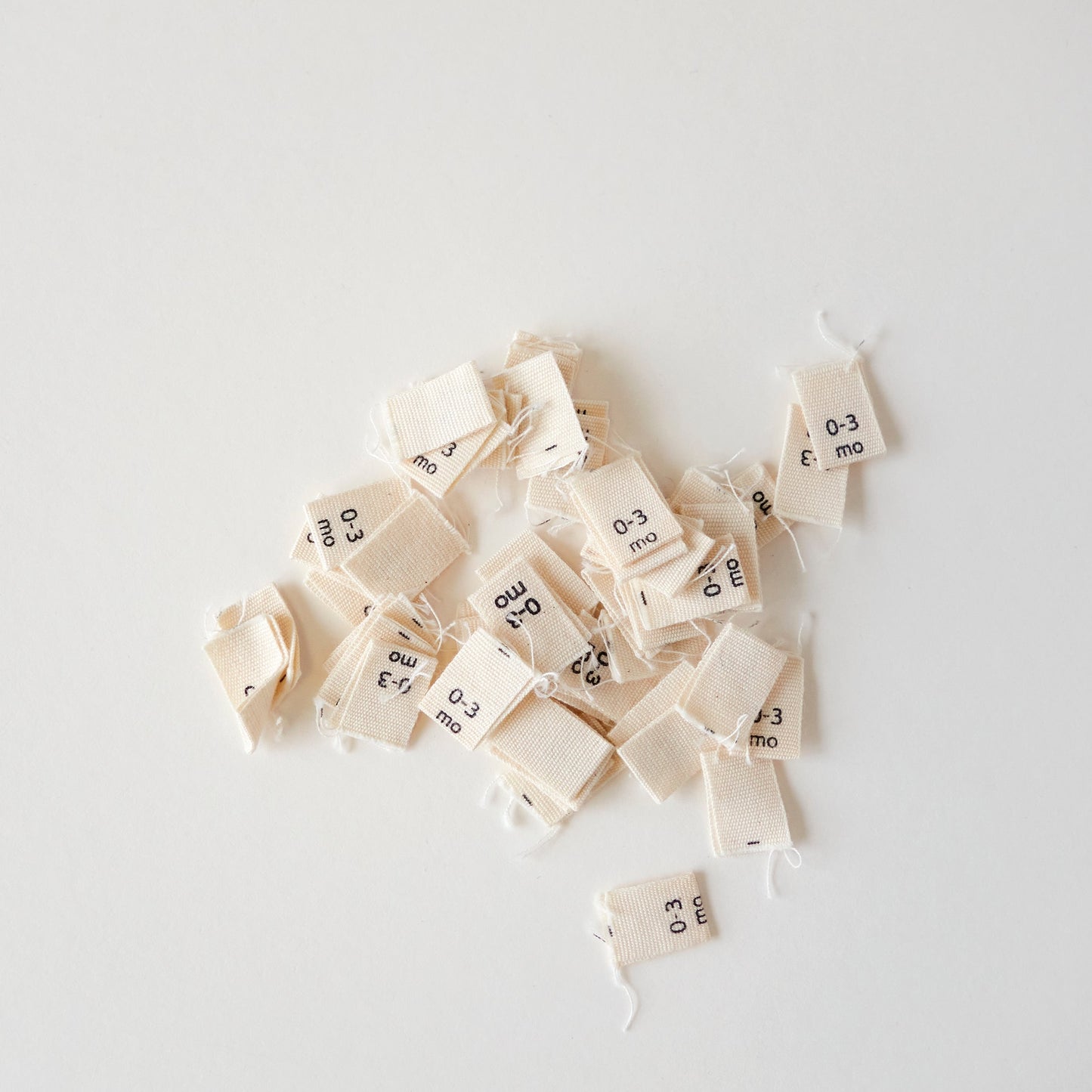 Size cotton labels - NB at 24m