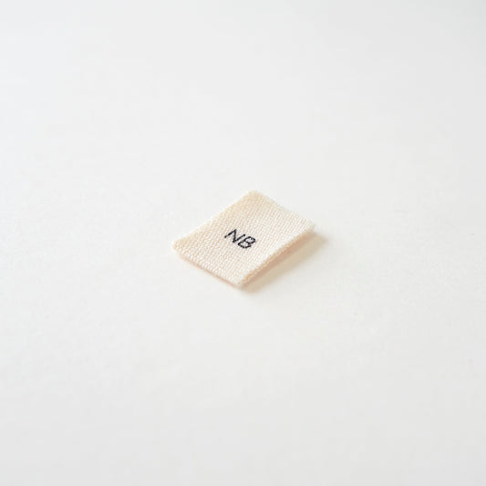 Size cotton labels - NB at 24m